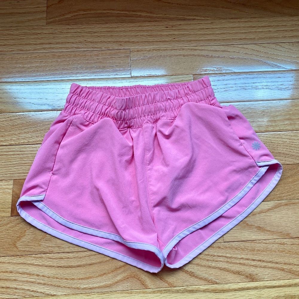Athleta Girl Run Free 2.5” pink shorts, size XS/6. Like NEW